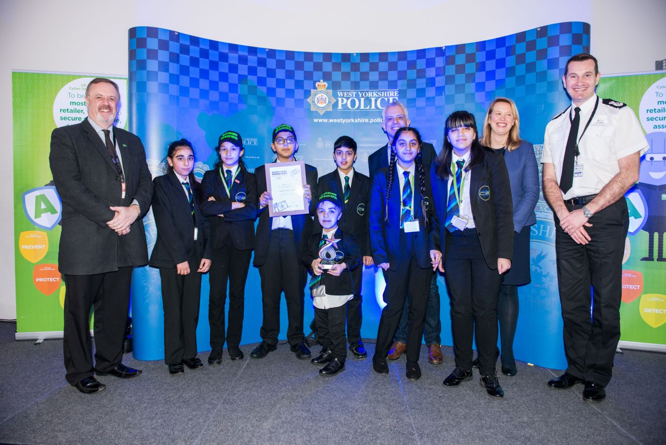 PCC Mark Burns-Williamson with Chief Constable John Robins and the winners of the 2019 West Yorkshire Police Schools Cyber Competition, Carlton Bolling College